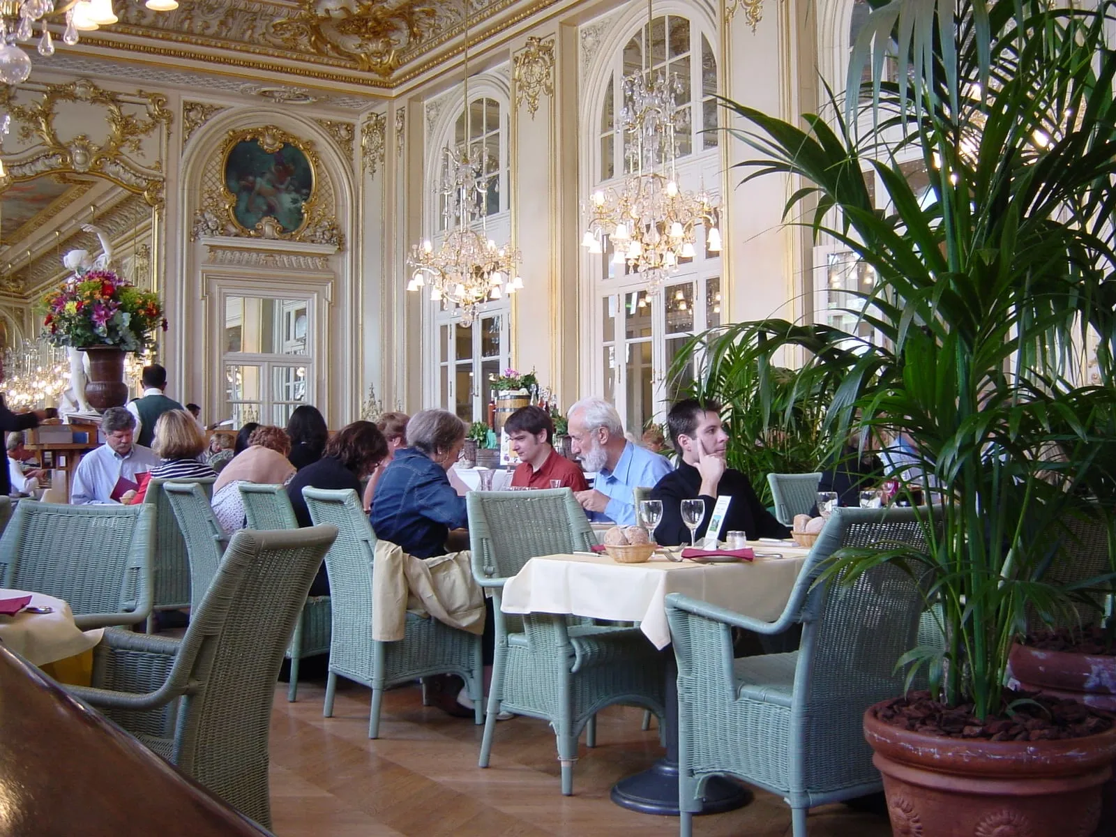 The vaulted former railway hall of the Musée d'Orsay with its great clock above a level stone floor