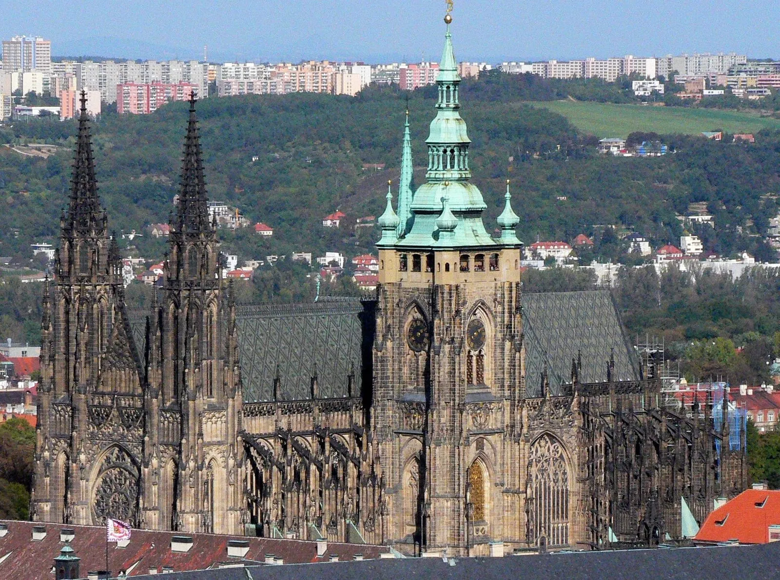 The courtyard of Prague Castle with St Vitus Cathedral rising above heavy granite cobbles